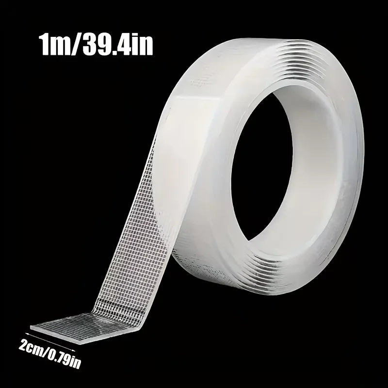 Roll of 1m/39.4in heavy duty double-sided transparent mounting tape shown flat.