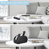 A black PU leather remote control holder with five compartments resting on a white table.