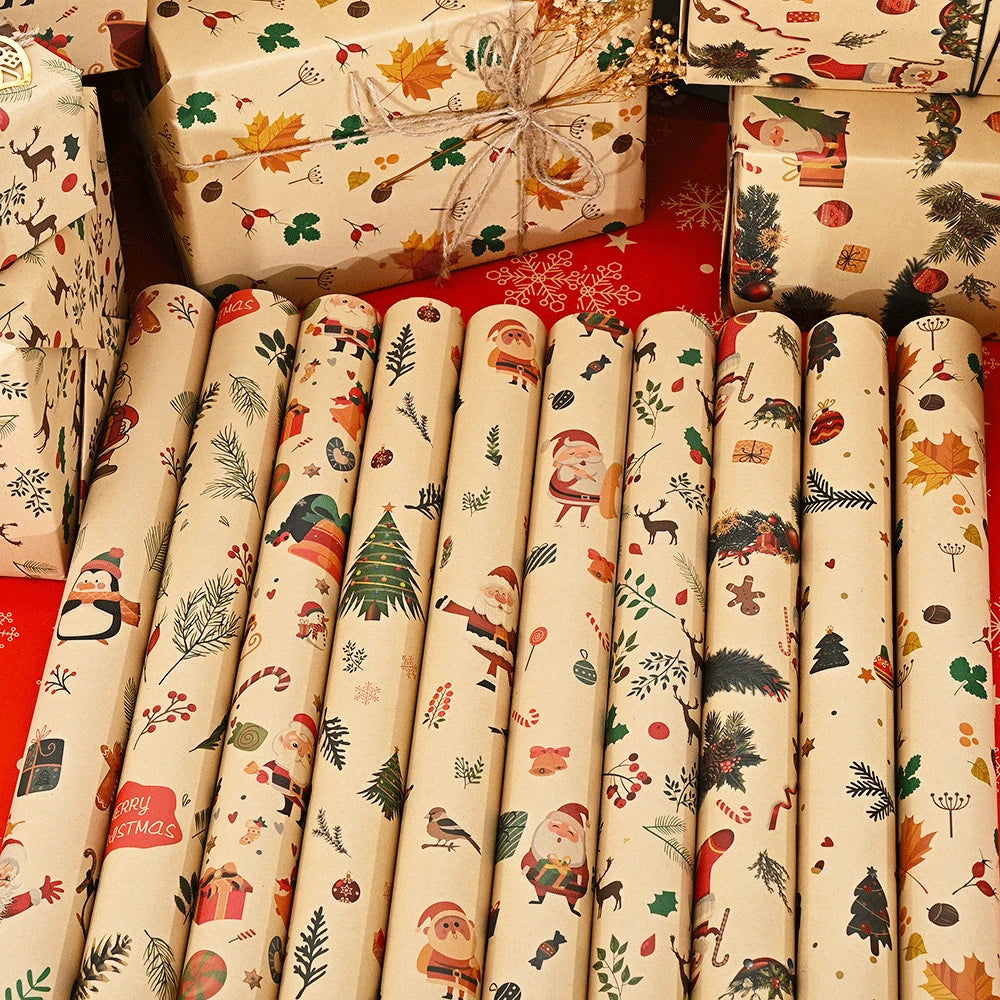 A set of Merry Christmas wrapping paper featuring Santa and tree designs on rolled paper.
