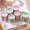 A collection of floral vine transparent PET washi tape in various shades and colors displayed on a white background.