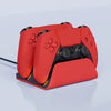 A red Dual PS5 controller charging station with a dock and cable shown on a light gray surface.