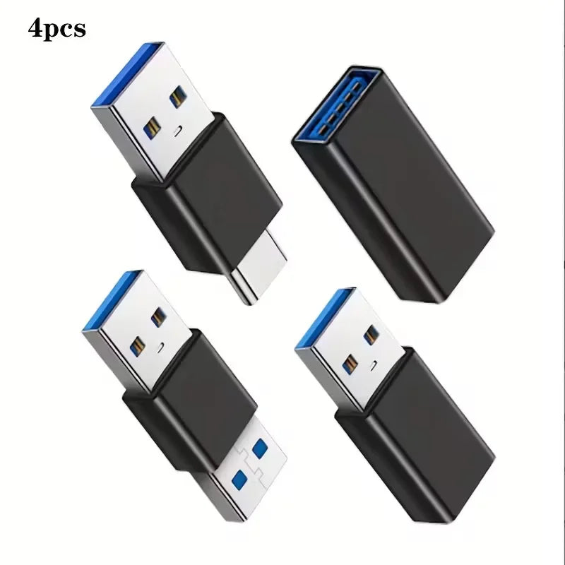 A set of four black USB-C adapters with various connectors including USB-A and Micro USB ports.