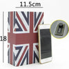 A rectangular box decorated with a Union Jack pattern next to a smartphone.