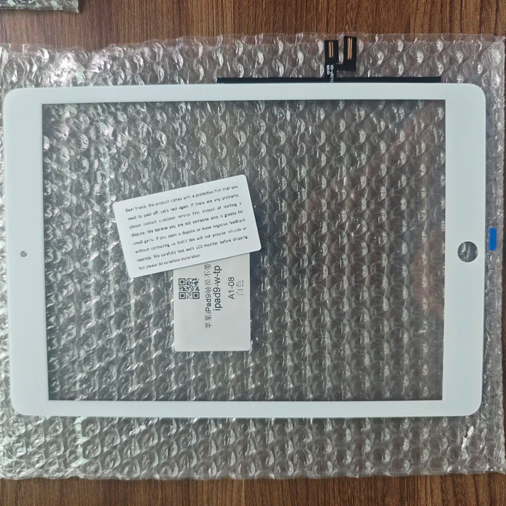 A white iPad 9th Generation screen replacement with a home button is visible inside clear plastic packaging.