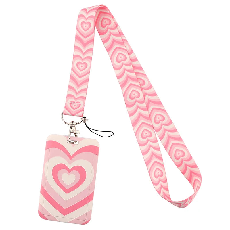 Pink heart pattern lanyard with a tag for ID badges and accessories