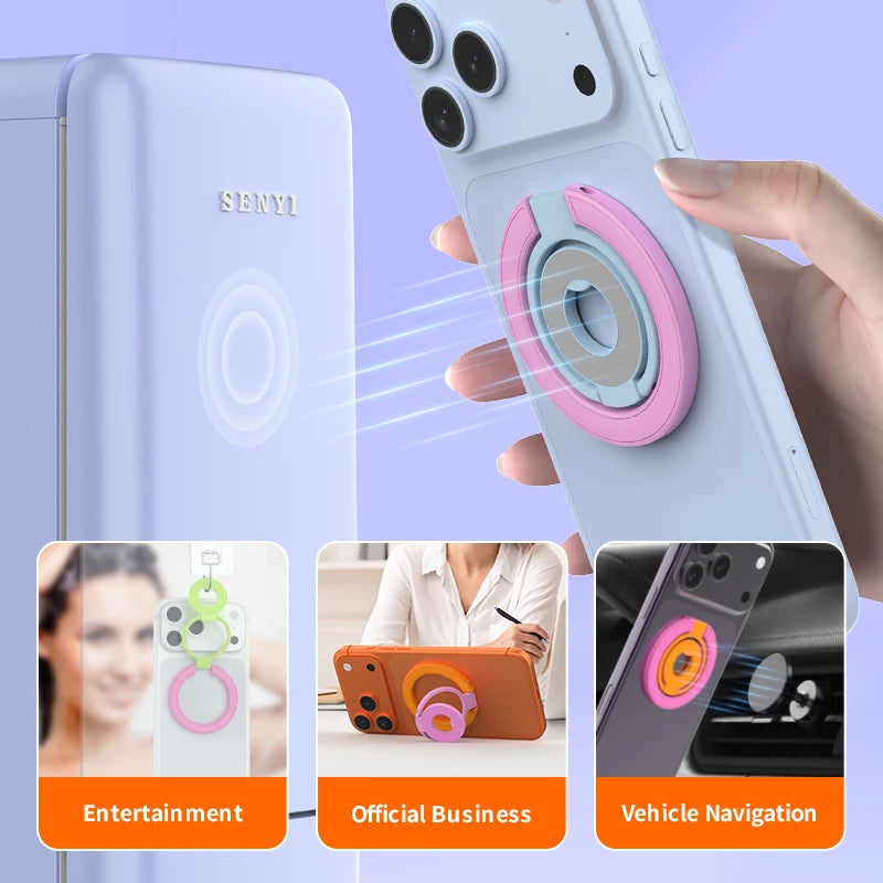 A hand holds a white smartphone displaying a pink ring holder accessory for entertainment, business, and vehicle navigation.