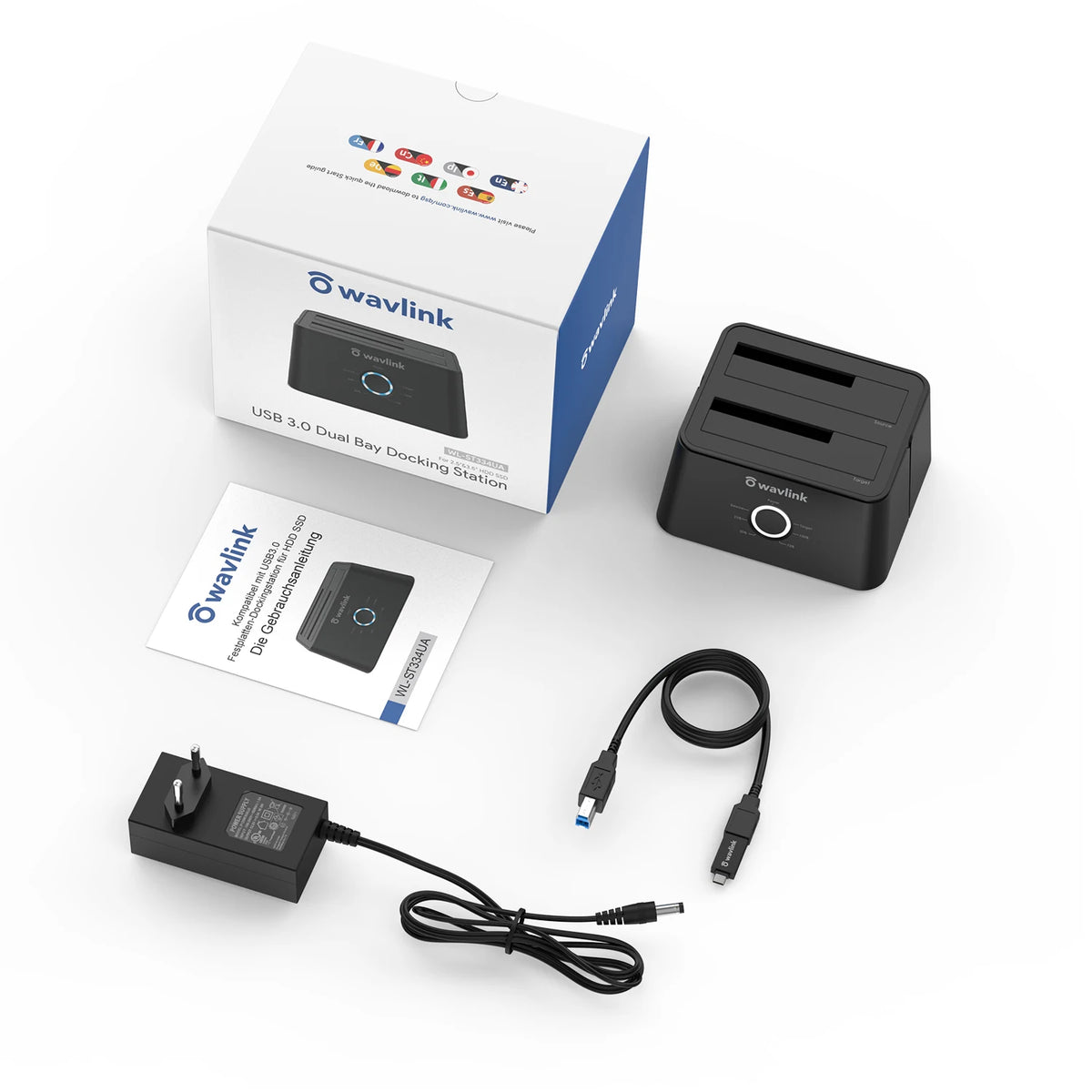 A black USB 3.0 Dual Bay Docking Station with a cable and packaging box is shown on a white surface.