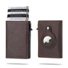 A brown leather wallet with a card pop-up feature and an Apple logo embossed on the cover.