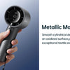 A hand holds a matte black handheld fan with an oxidized metallic finish and an LED display.