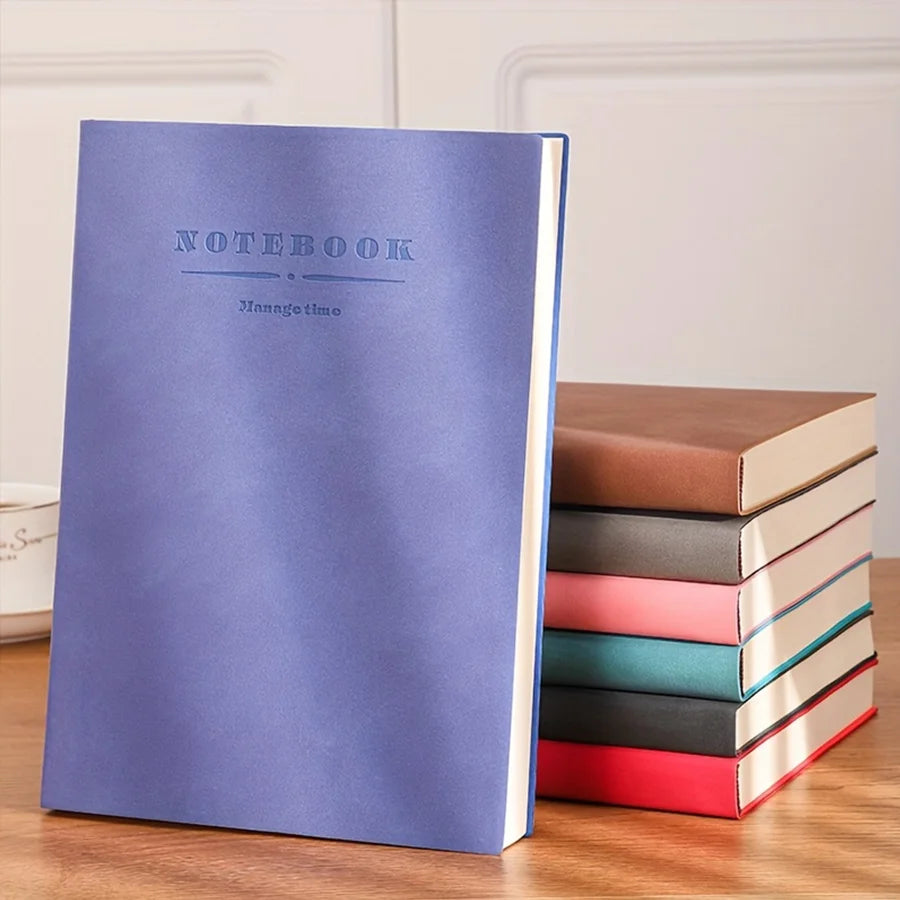A purple notebook titled ManageTime is displayed next to a stack of brown and colored notebooks.
