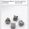 Three gray mechanical keyboard switches are shown on a white surface.