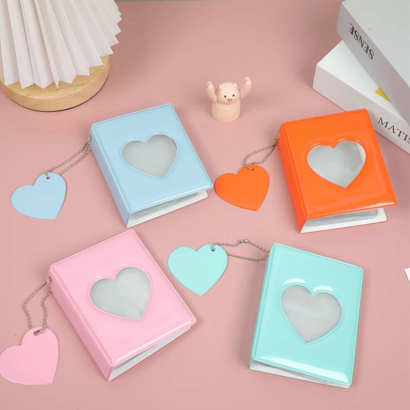 A collection of pastel colored hollow photo card binders in various shades including blue, orange, pink, and mint green.