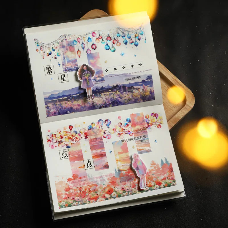 An open notebook page featuring watercolor illustrations and decorative elements for journaling or scrapbooking.