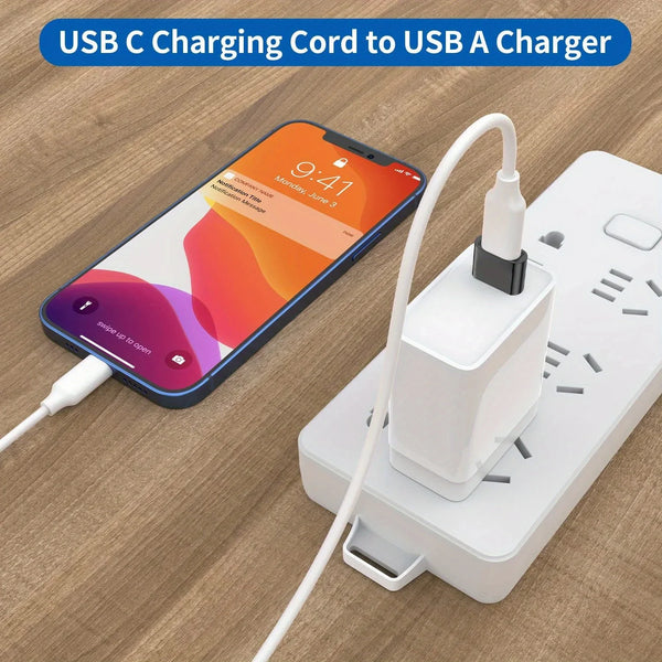 A white USB C charging cord adapter is shown next to a smartphone and a power adapter.