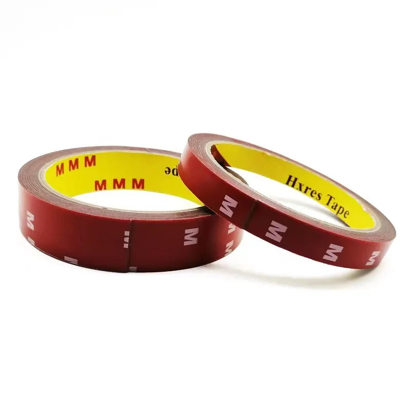 Roll of red double-sided acrylic foam tape with yellow markings and 'MM' text