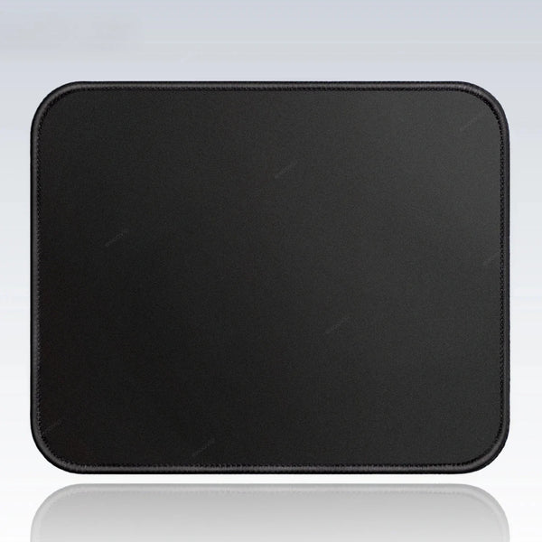 Black portable gaming mouse pad with a stitched edge shown on a reflective surface.