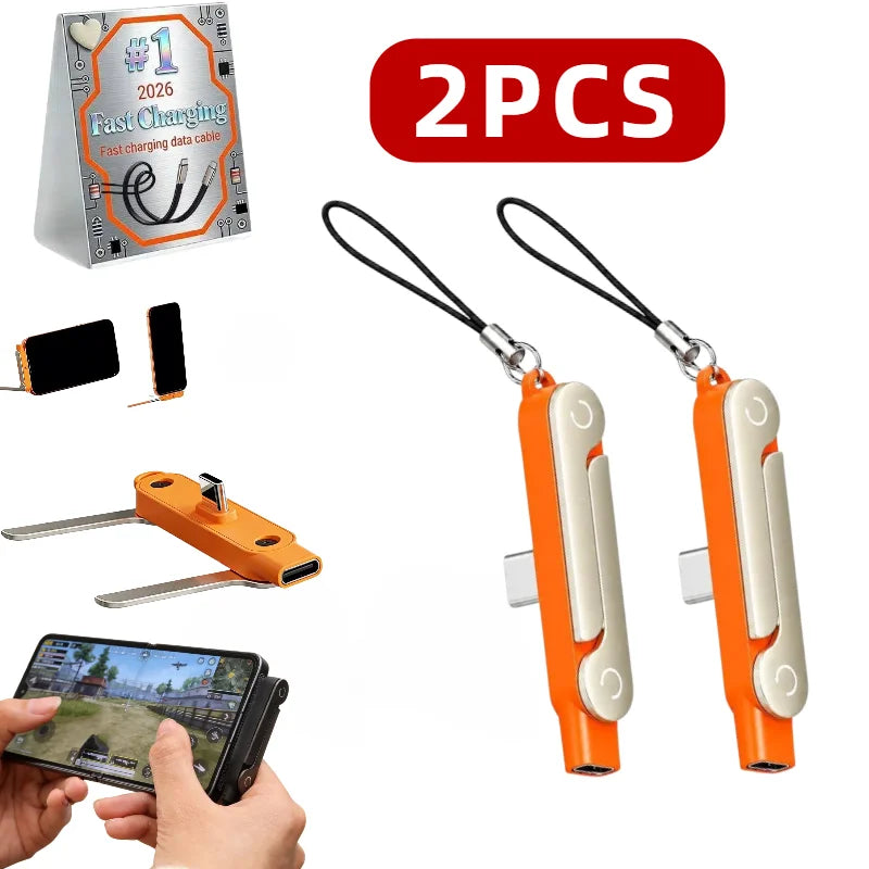 Two orange foldable USB-C to USB-C charging adapters and a phone stand are shown.