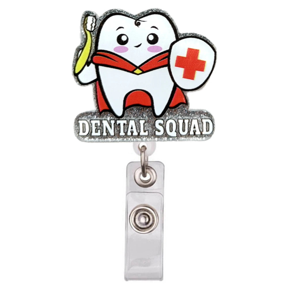 Glitzer-Acryl-Ausweisclip in Zahnform mit Kreuz und roter Schleife