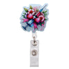 Glitzer-Acryl-Ausweisclip mit stilisierter medizinischer Spritze umgeben von rosa und grünen Blumen