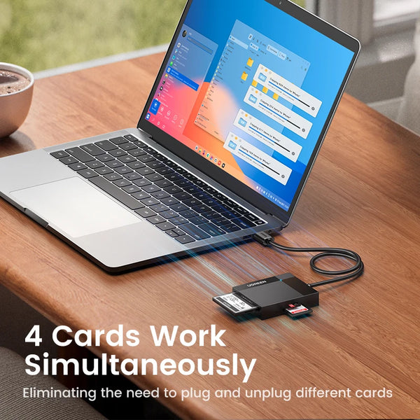 A laptop is shown with a multi card reader adapter plugged in, demonstrating simultaneous card usage.