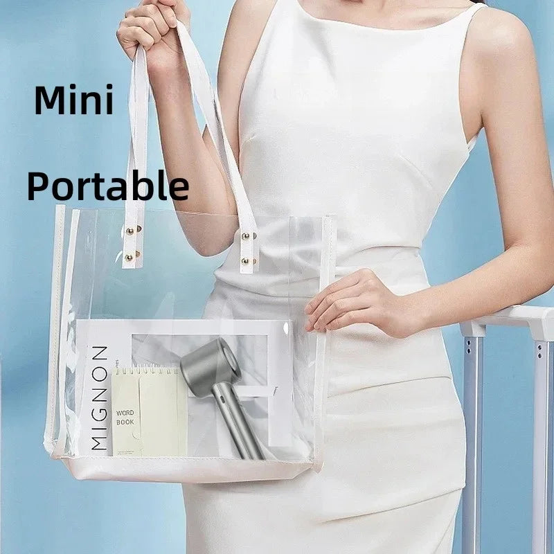 A woman holds a mini portable clear bag containing a powerful handheld bladeless cooling fan.
