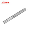 A stainless steel measuring ruler marked in millimeters, showing a scale up to 20 cm.