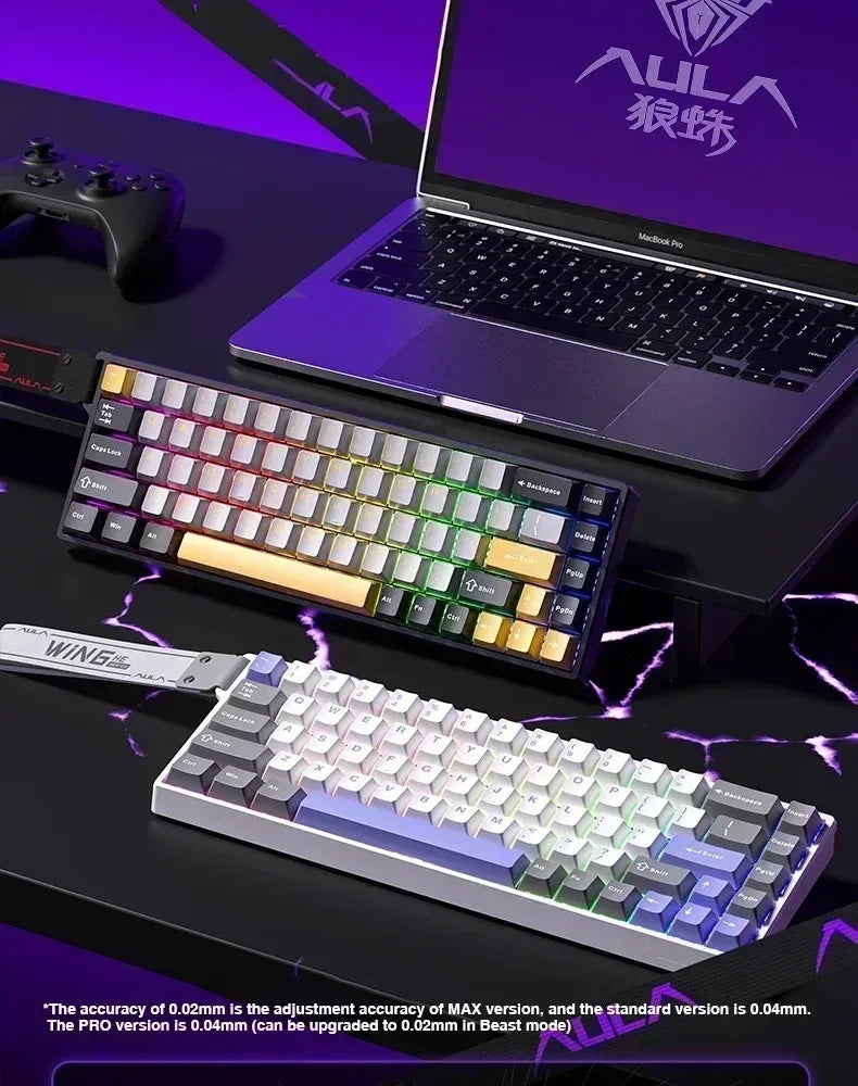 A purple laptop is shown with a wired compact gaming keyboard and a separate mechanical keyboard on a dark surface.