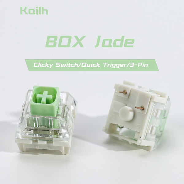 A close-up view of a green tactile clicky mechanical switch labeled BOX Jade with a 3-pin connector.