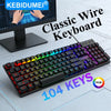 A close-up view of a black RGB wired keyboard with 104 keys resting on a gray surface.