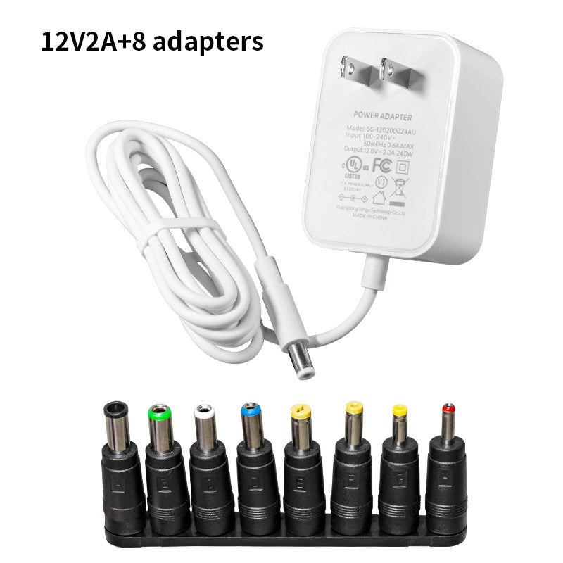 A set of 12V 2A+8 power adapters and various DC switching plugs are displayed.