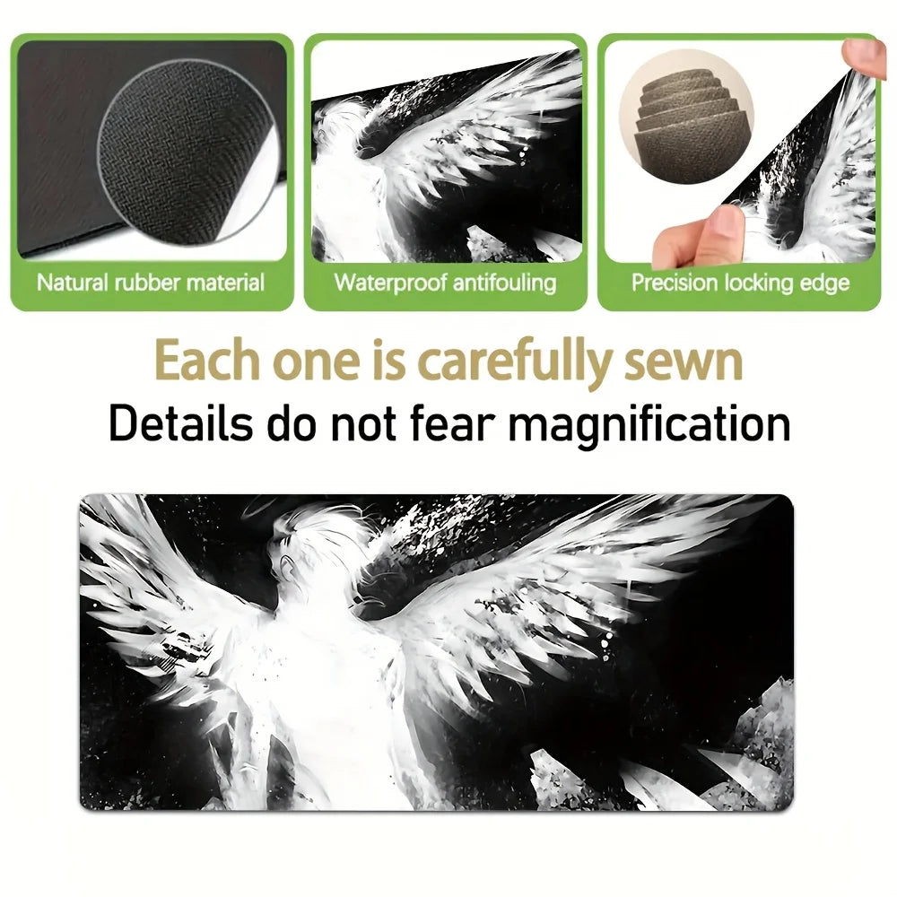 Black and white artistic angel wing design on a desk mat or mouse pad