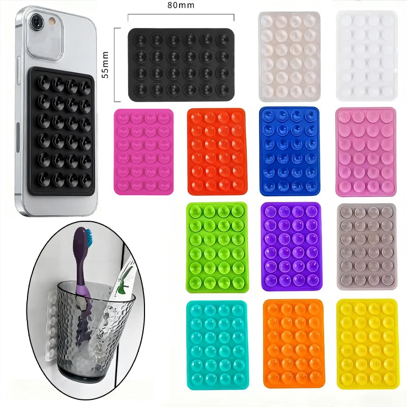 A set of 24 silicone suction cups for mounting phones and tablets, shown alongside a smartphone and various colored cups.