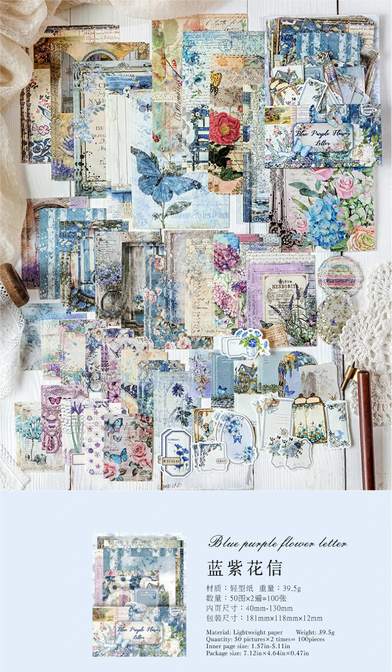 A collection of blue and purple floral papers, stamps, and decorative elements for a DIY scrapbook or journaling project.