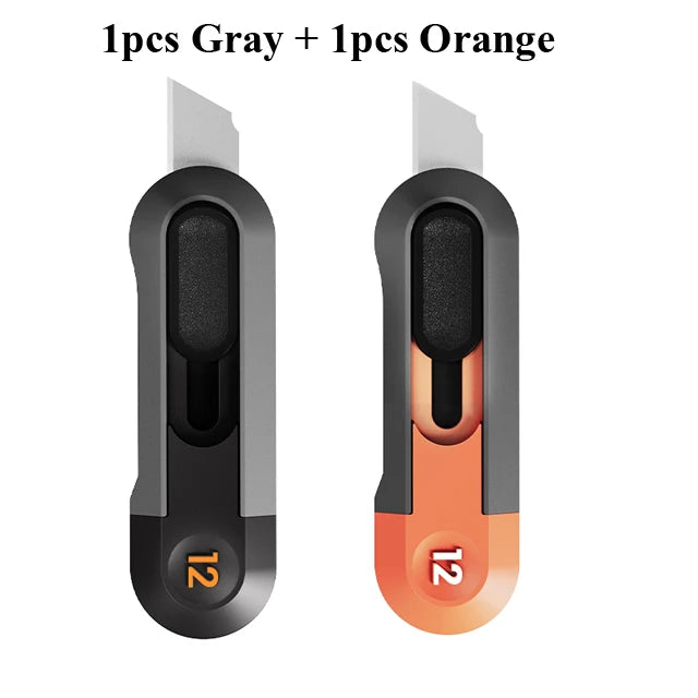 Two mini pocket knives, one gray and one orange, shown side by side.