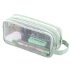 A transparent mesh pencil pouch with a light green strap and a white brush inside.