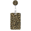 A leopard print retractable badge holder with a round charm.