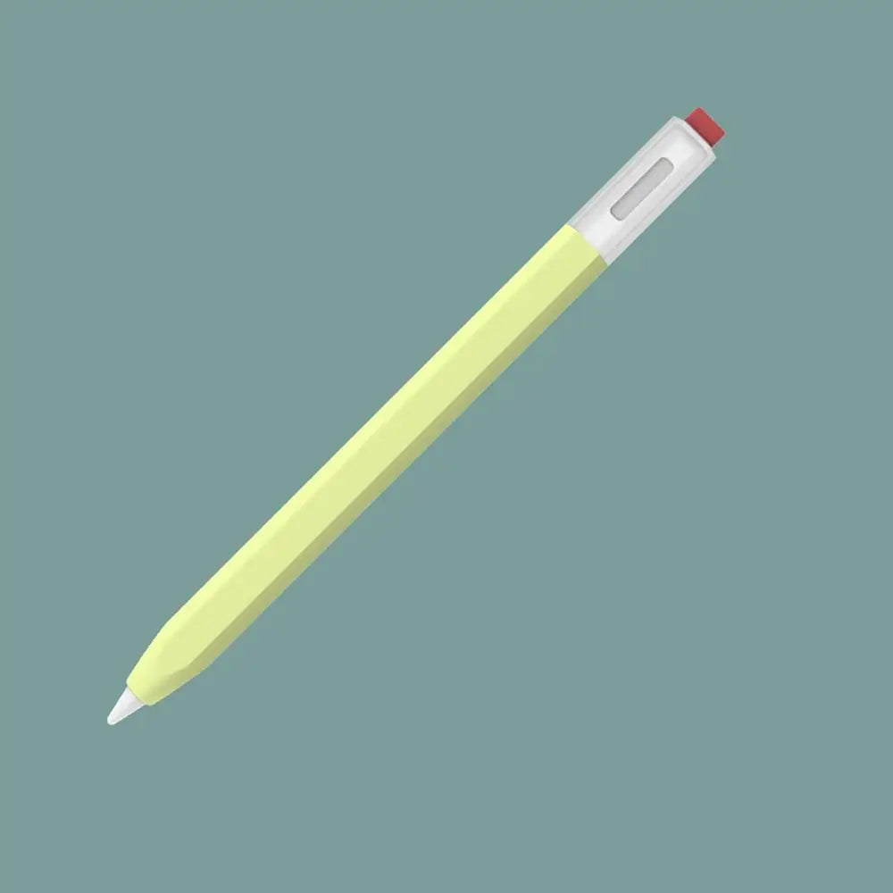 A yellow silicone stylus pen with a red tip and white body, shown diagonally against a muted green background.