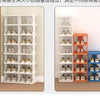 A set of portable plastic shoe hangers displayed in white and orange storage racks.
