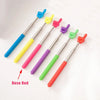 A set of colorful telescopic stainless steel teaching pointers with various colored tips.