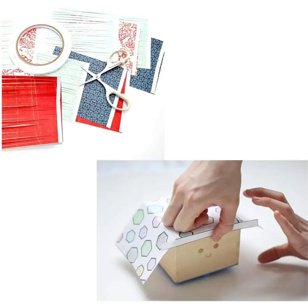 A hand is applying double-sided craft adhesive tape to a small cardboard box.