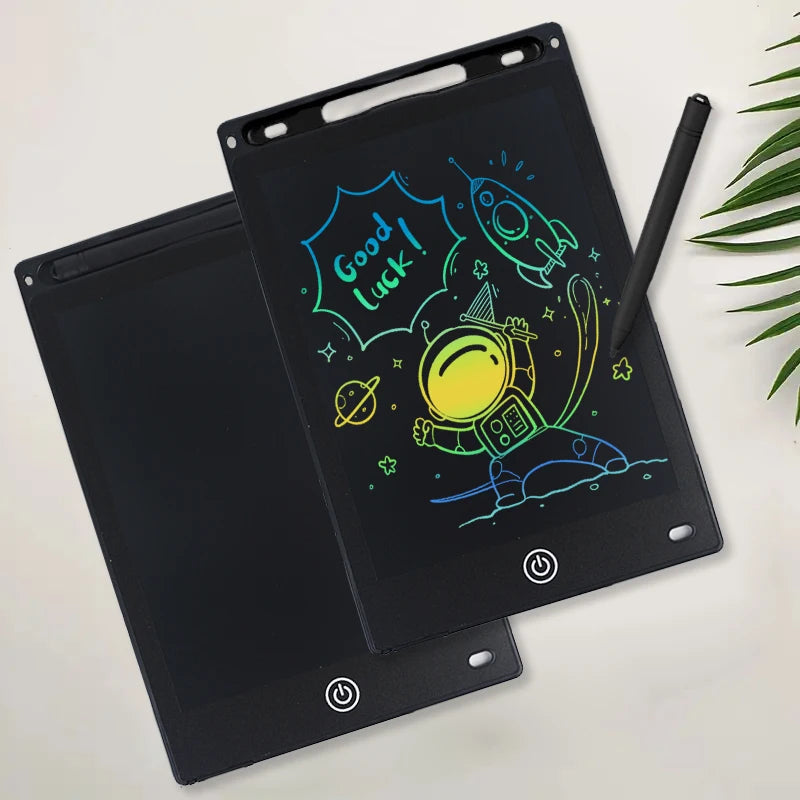 A black portable LCD drawing tablet showing a cartoon rocket and the text Good Luck!