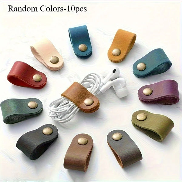 A collection of ten random colored faux leather data cable earphones are displayed on a white background.