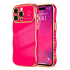 Funda de silicona rosa brillante para iPhone mostrando la hora 9:41 en la pantalla.