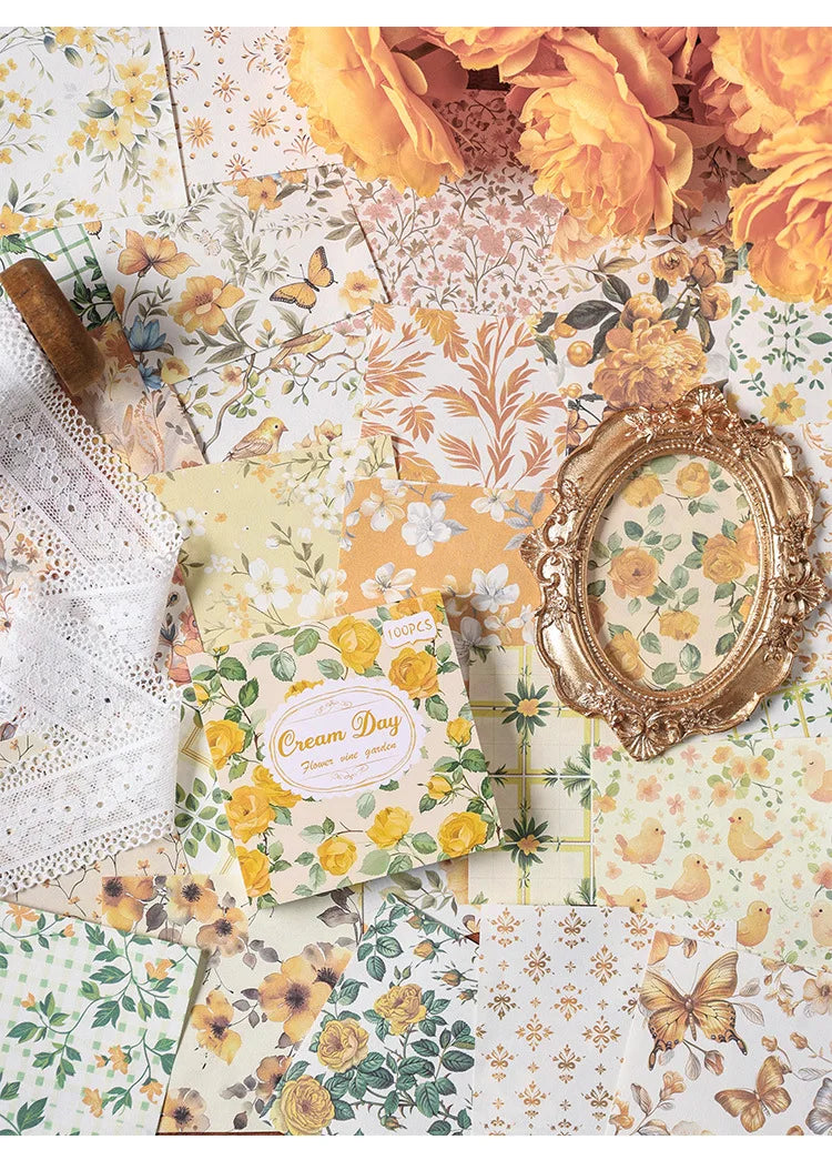 A vintage floral square scrapbook paper set featuring yellow and orange flowers and leaves.