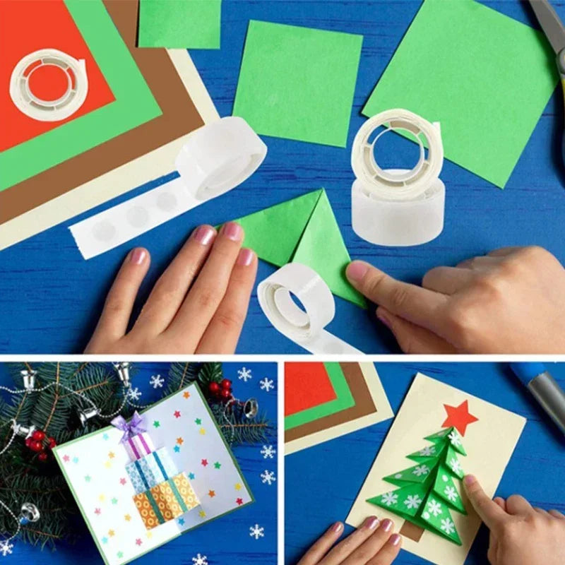 Hands are applying clear double-sided adhesive dots onto green paper for crafting projects.