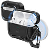 A black magnetic case for AirPods Pro with three white earbuds inside and a transparent circular accessory.