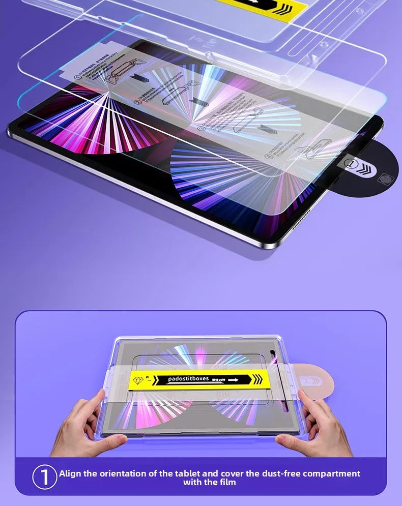 A hand aligns an iPad with a film to cover the dust-free compartment with a tempered glass screen protector.