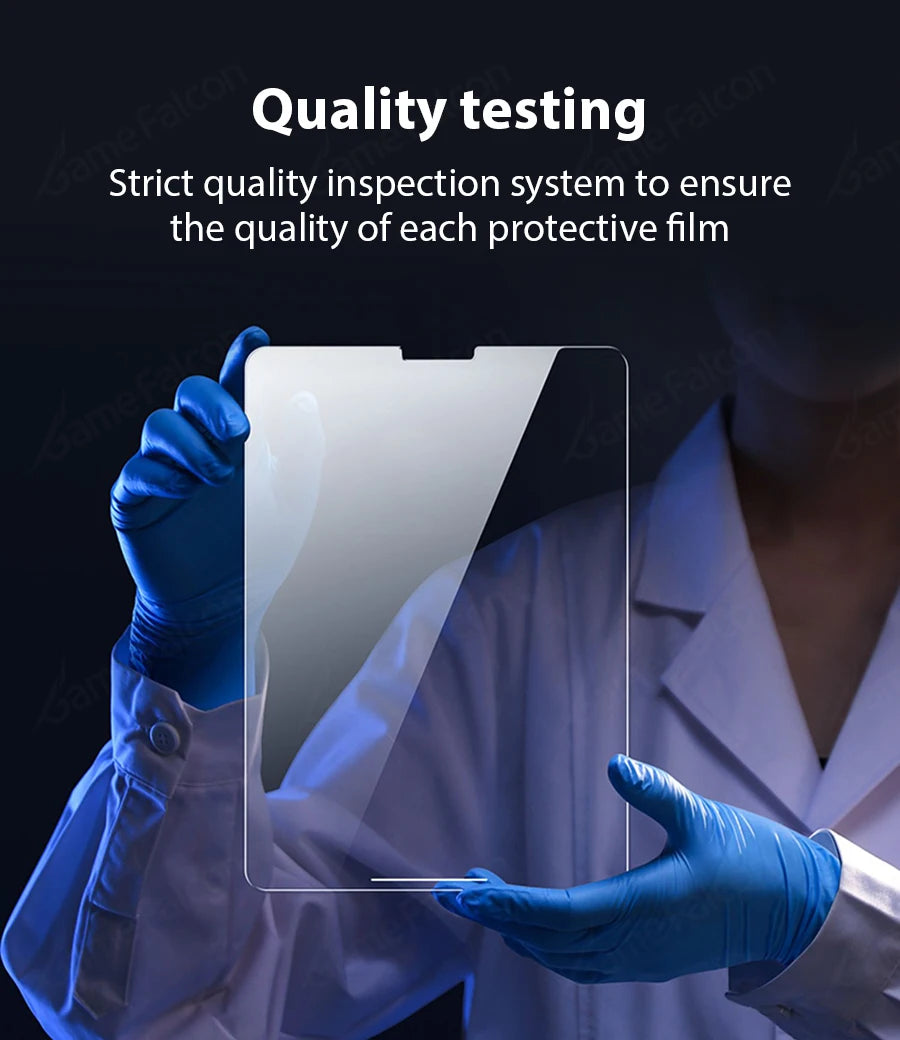 A hand in a blue glove is inspecting a clear protective film on an iPad screen under bright light.