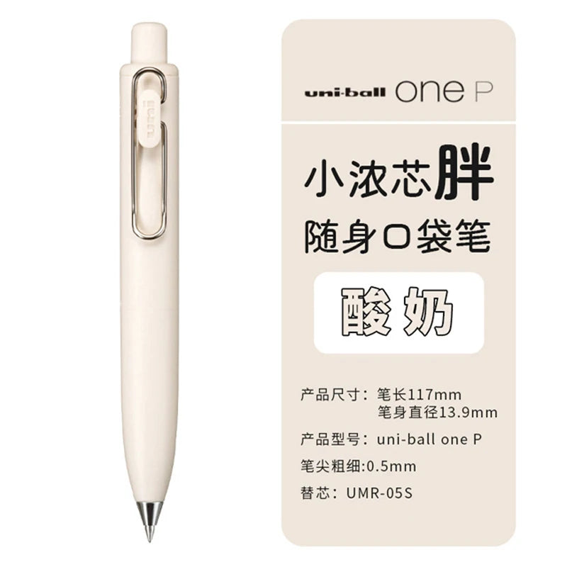 A white Uni-Ball One P pen is shown standing upright, featuring a smooth body and a silver clip.