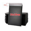 A stack of black bubble mailers with a 4cm dimension shown for secure shipping.